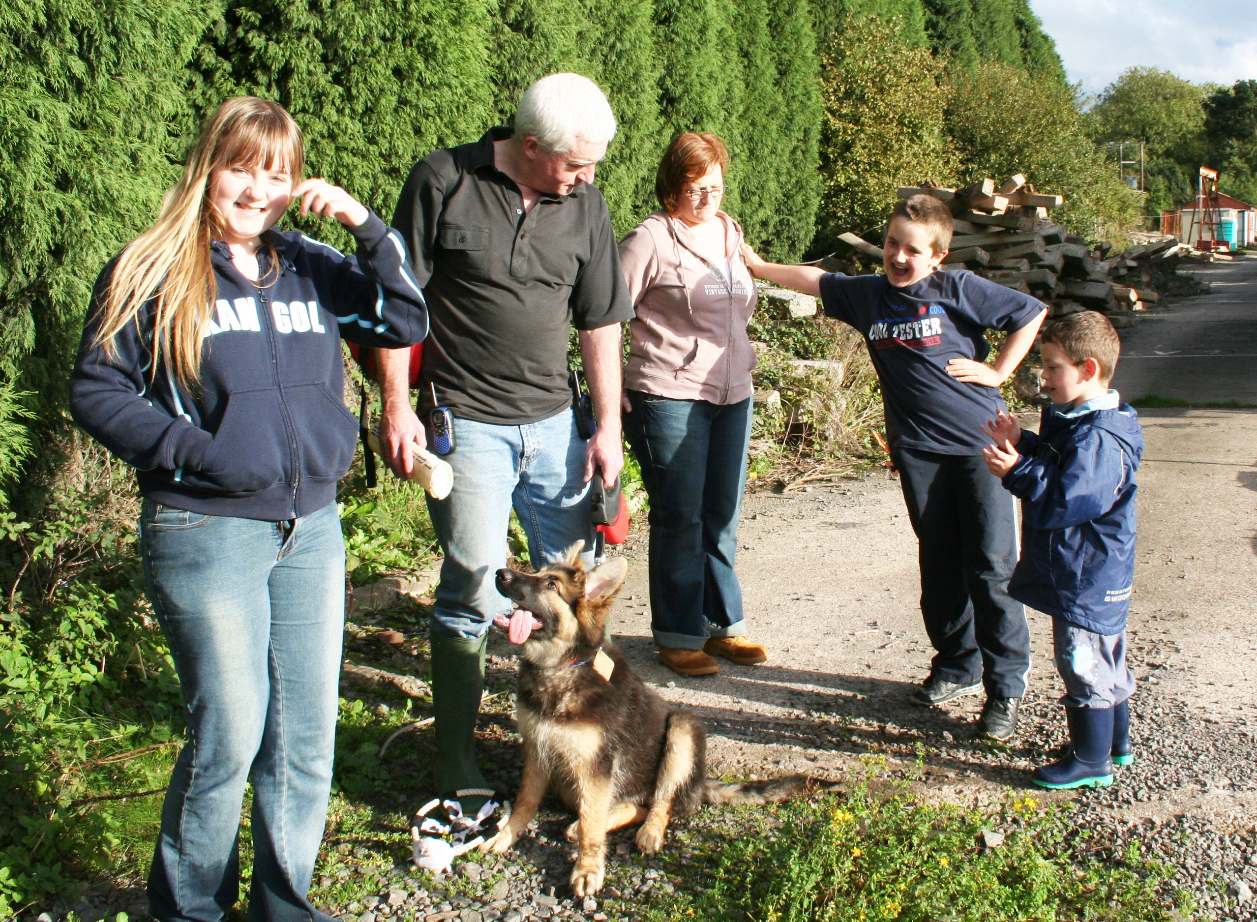 Puppy with family group